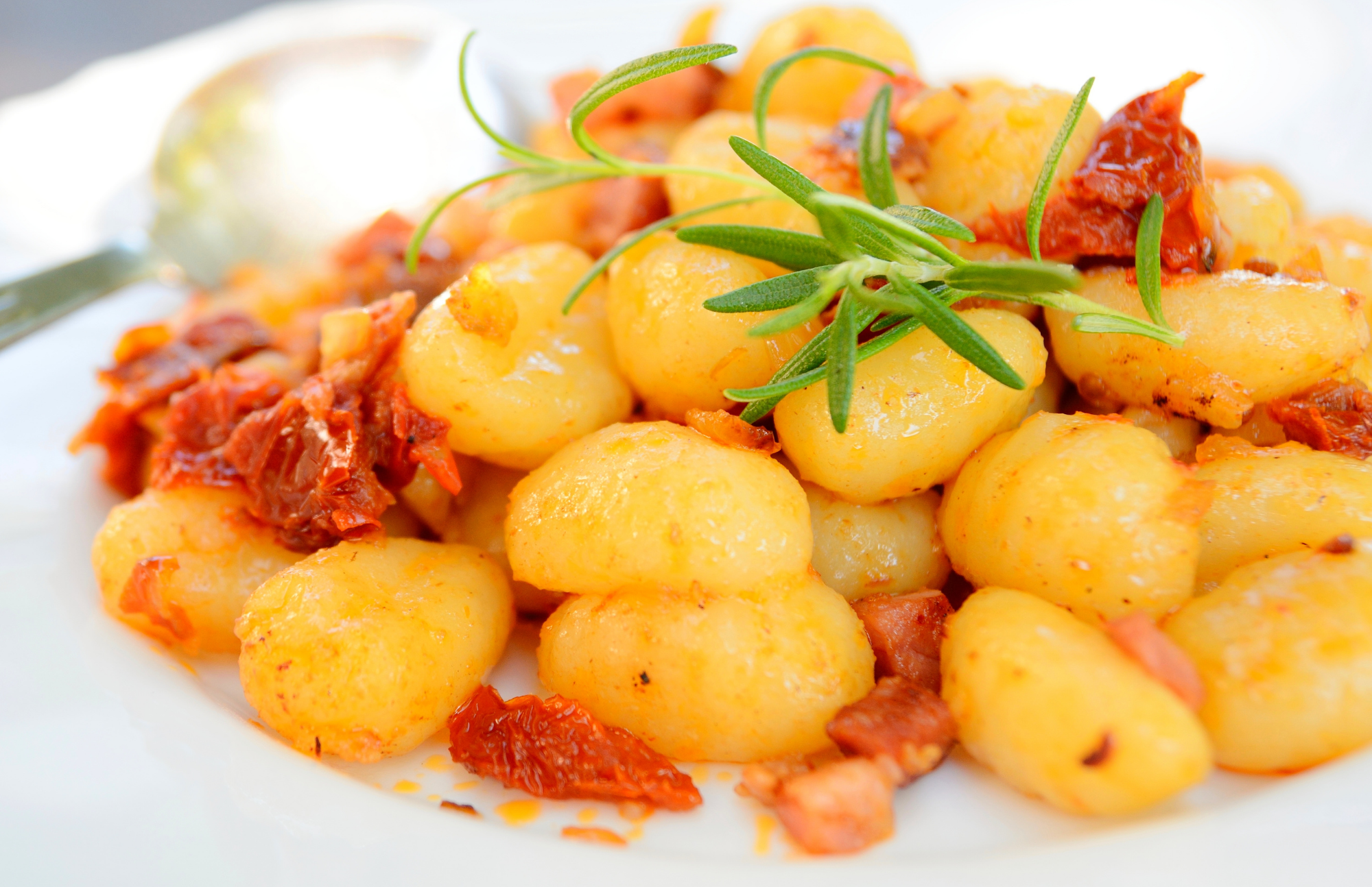 Gnocchi with tomatoes on a plate