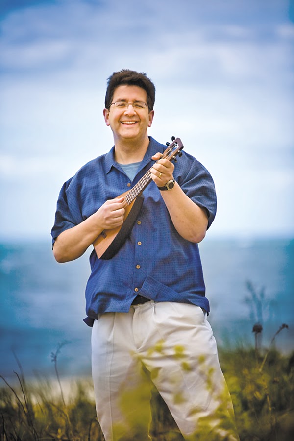 Jim Beloff holding a ukulele