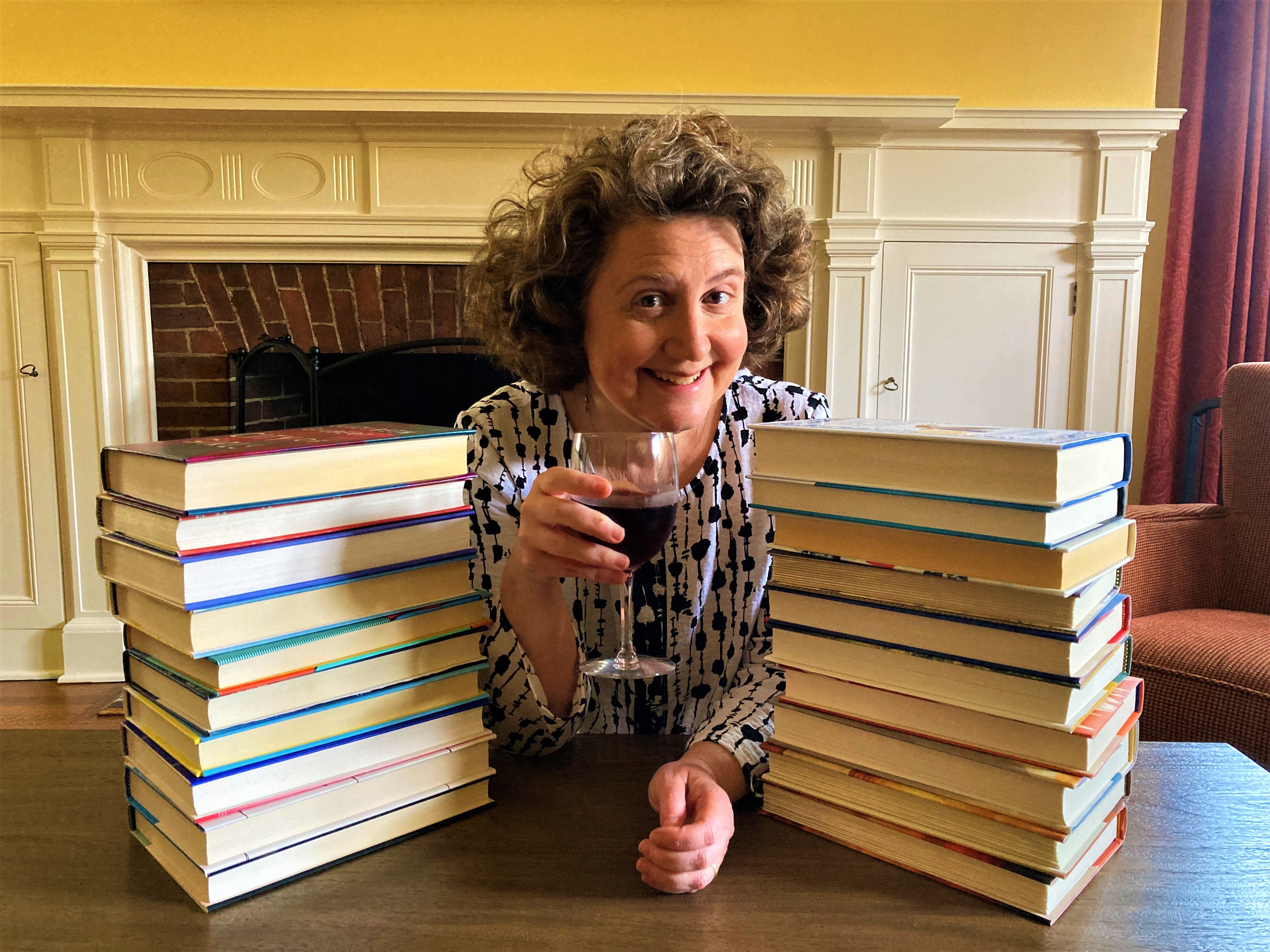 Cindy Haiken with books and wine