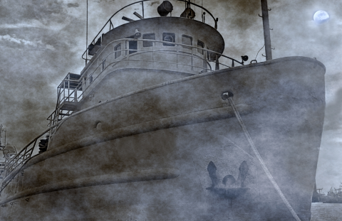 Grey ship in fog giving a spooky feel