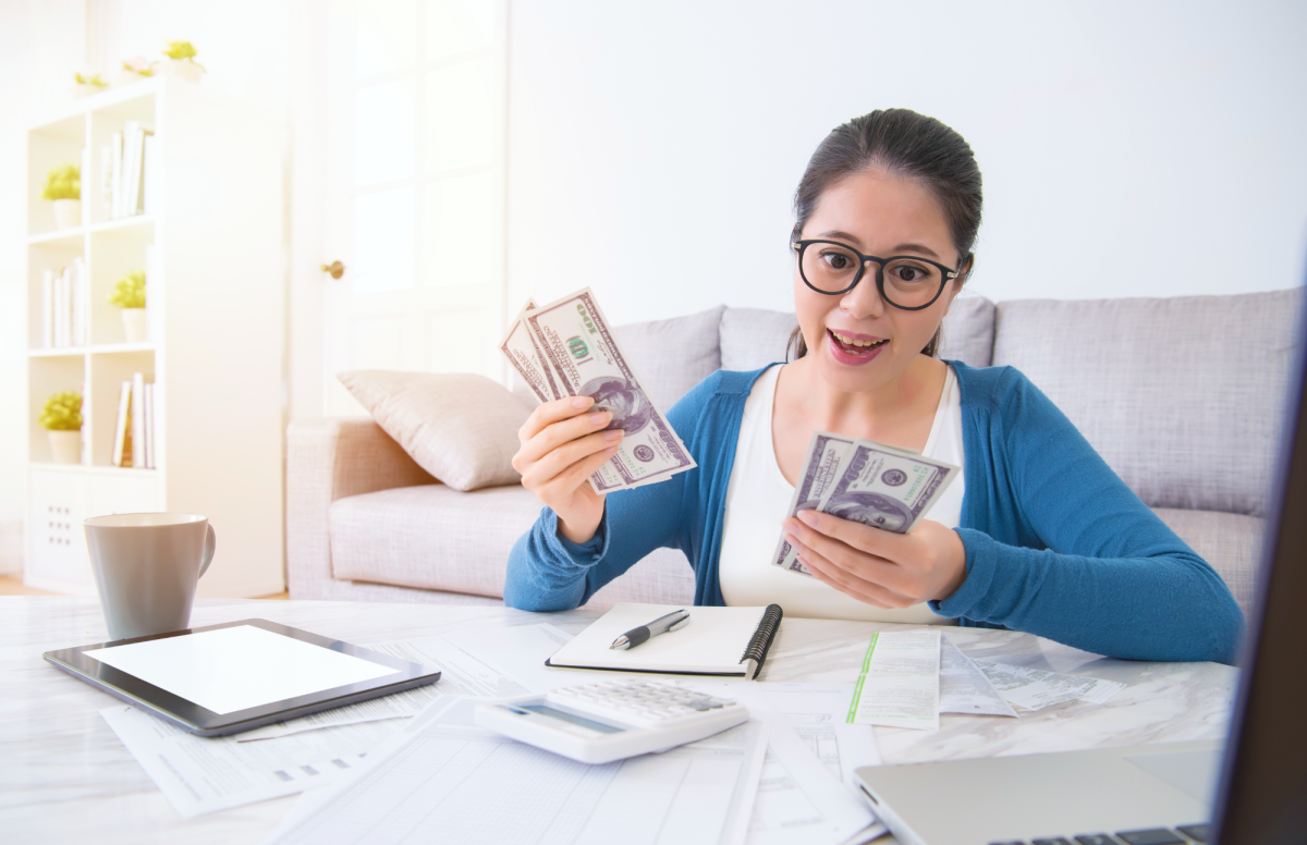 woman holding money